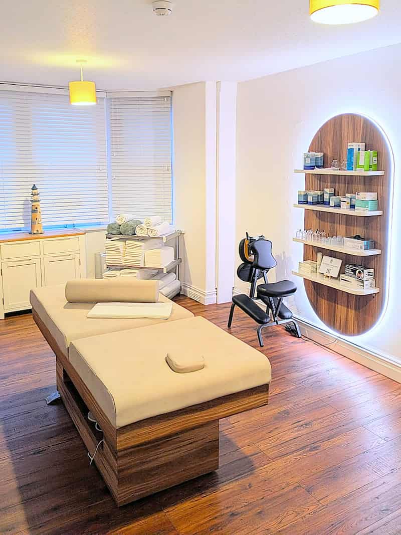 A massage table in a room