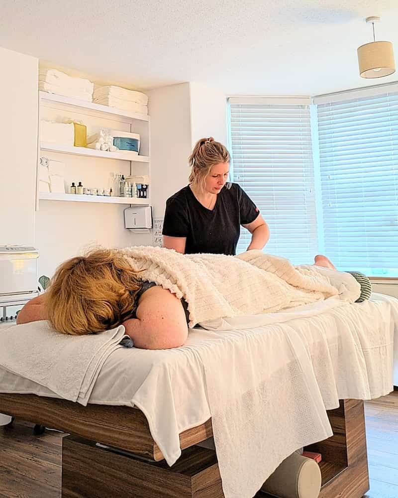 A woman receiving a massage